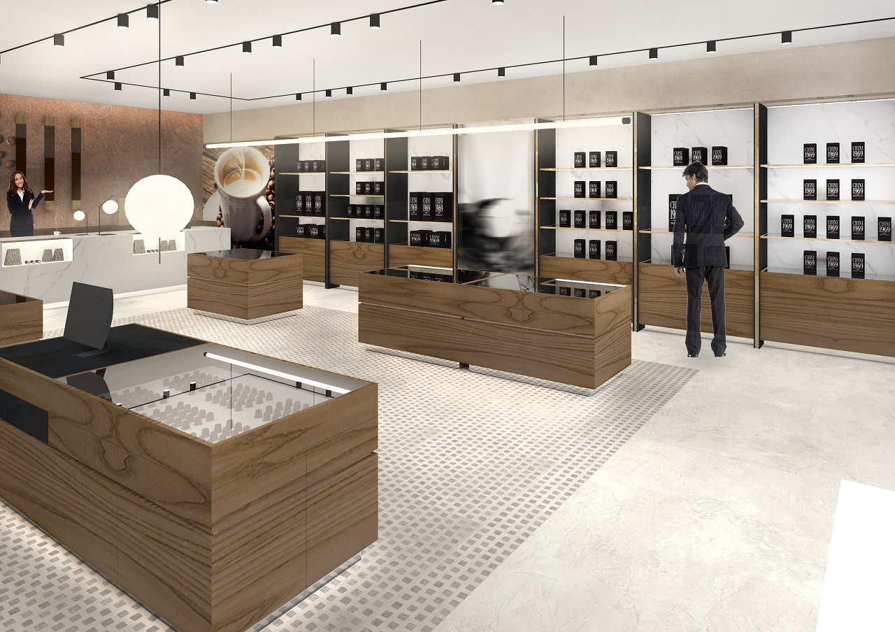 Interior design di una caffè boutique con finiture calde e raffinate, arredo su misura in legno di noce e metallo ottonato, che crea un'atmosfera contemporanea e richiama l'esperienza olfattiva delle miscele di caffè pregiate.