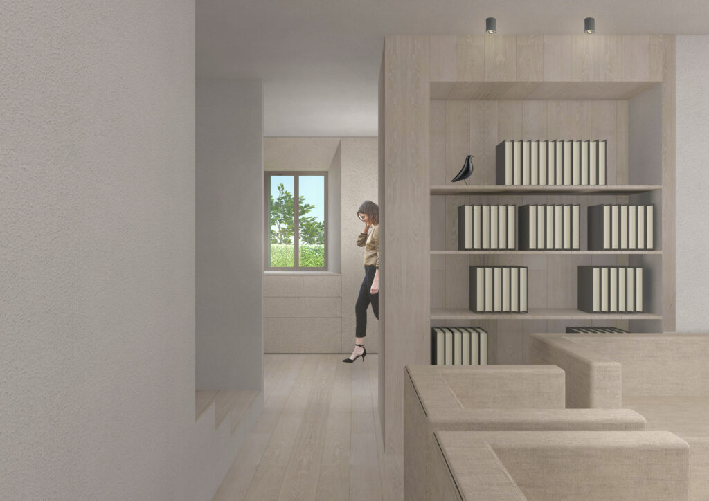casa sui Colli Euganei con arredo in legno naturale chiaro che si abbina al pavimento, creando una divisione elegante tra l'ingresso e la zona giorno.